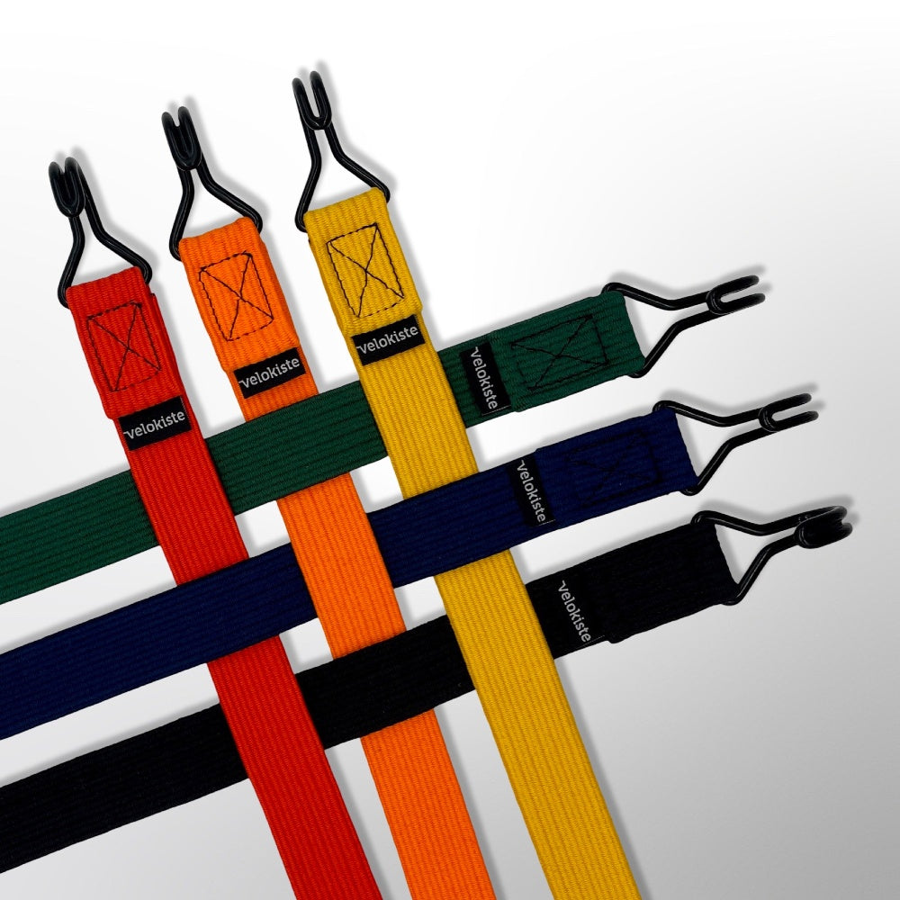 Farbige Gummizüge mit Haken von velokiste verwoben.