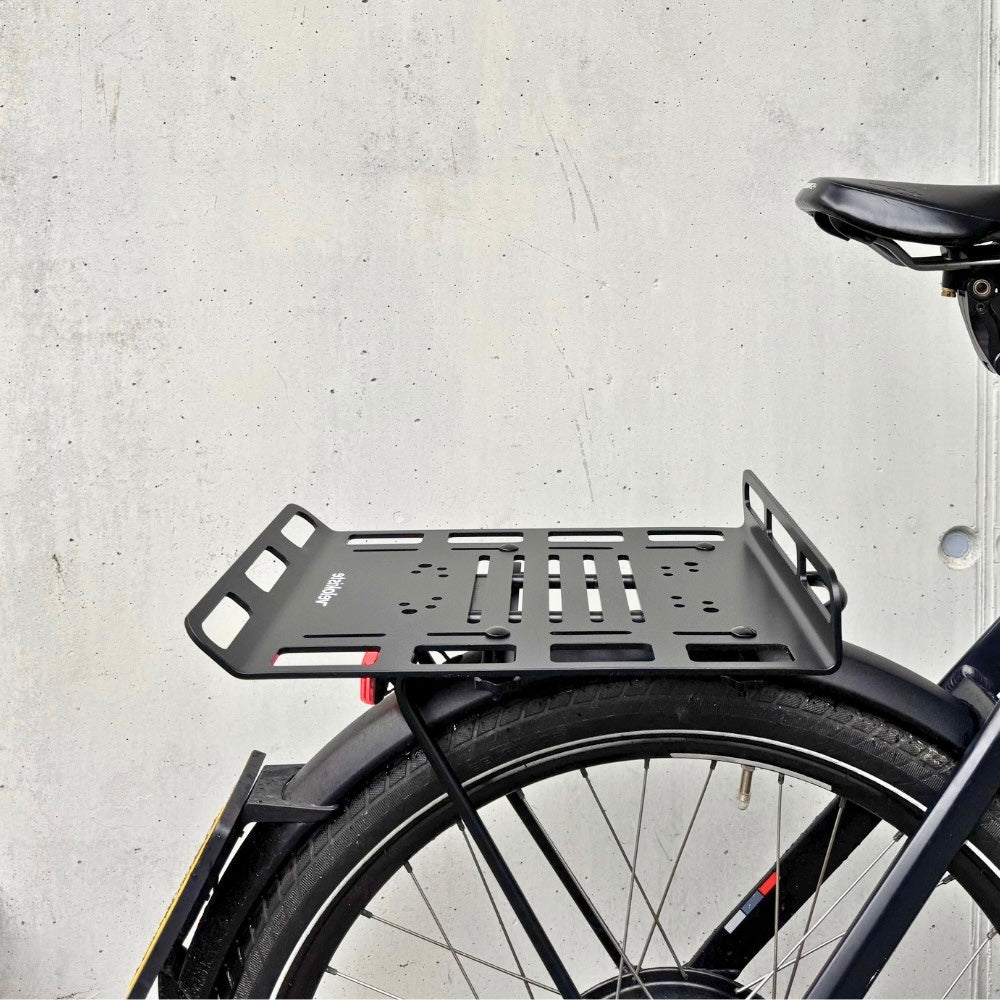 Velokorb transportsystem vor betonwand